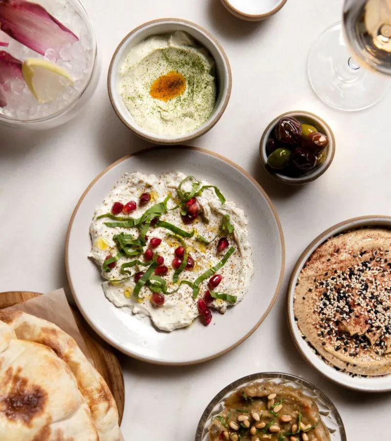Breakfast plates with eggs, oatmeal, fruit and more