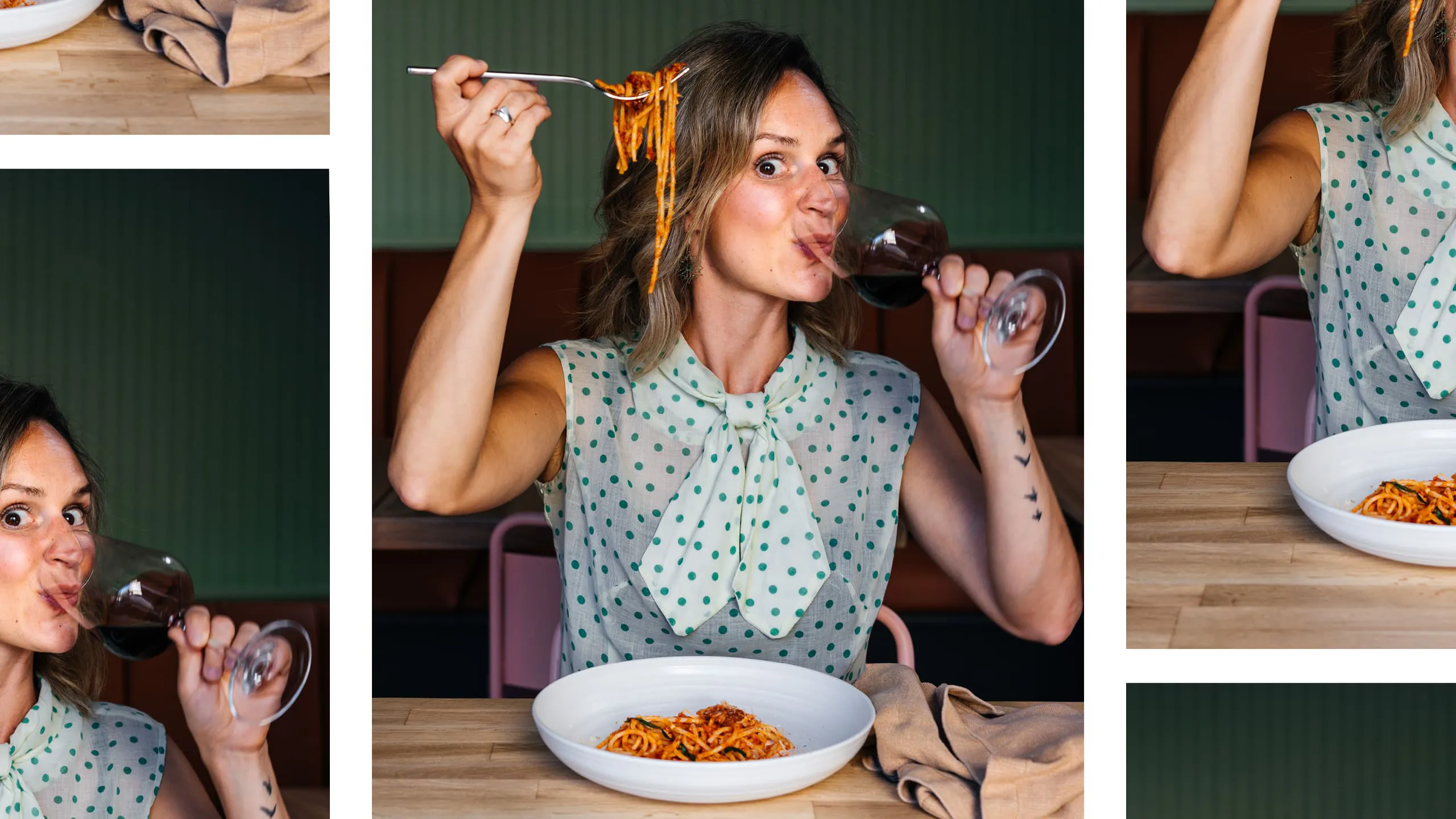 Woman playfully eating pasta while sipping a glass of red wine.