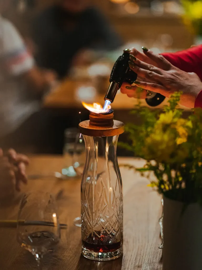 Candle lighting on a table