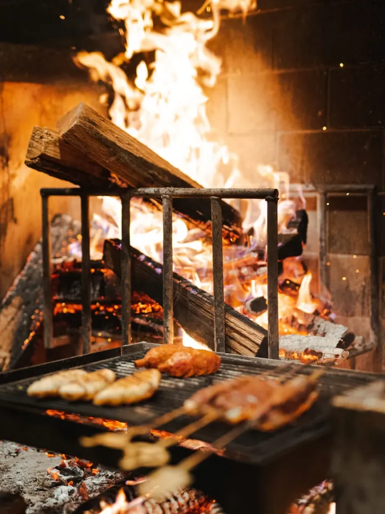 Fireplace with food on a grill